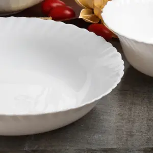 2-NHSP95T-SHULOPAL-white-opal-glass-soup-plate-9.5inch-soup-plate-spinning.webp